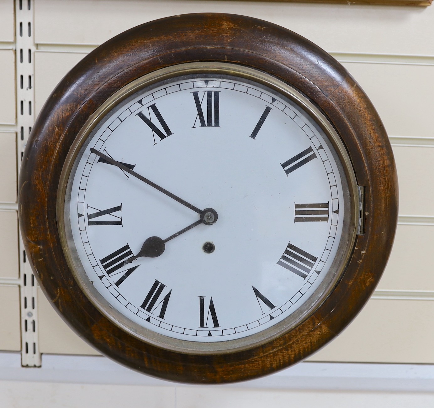 A mahogany cased wall clock, 12